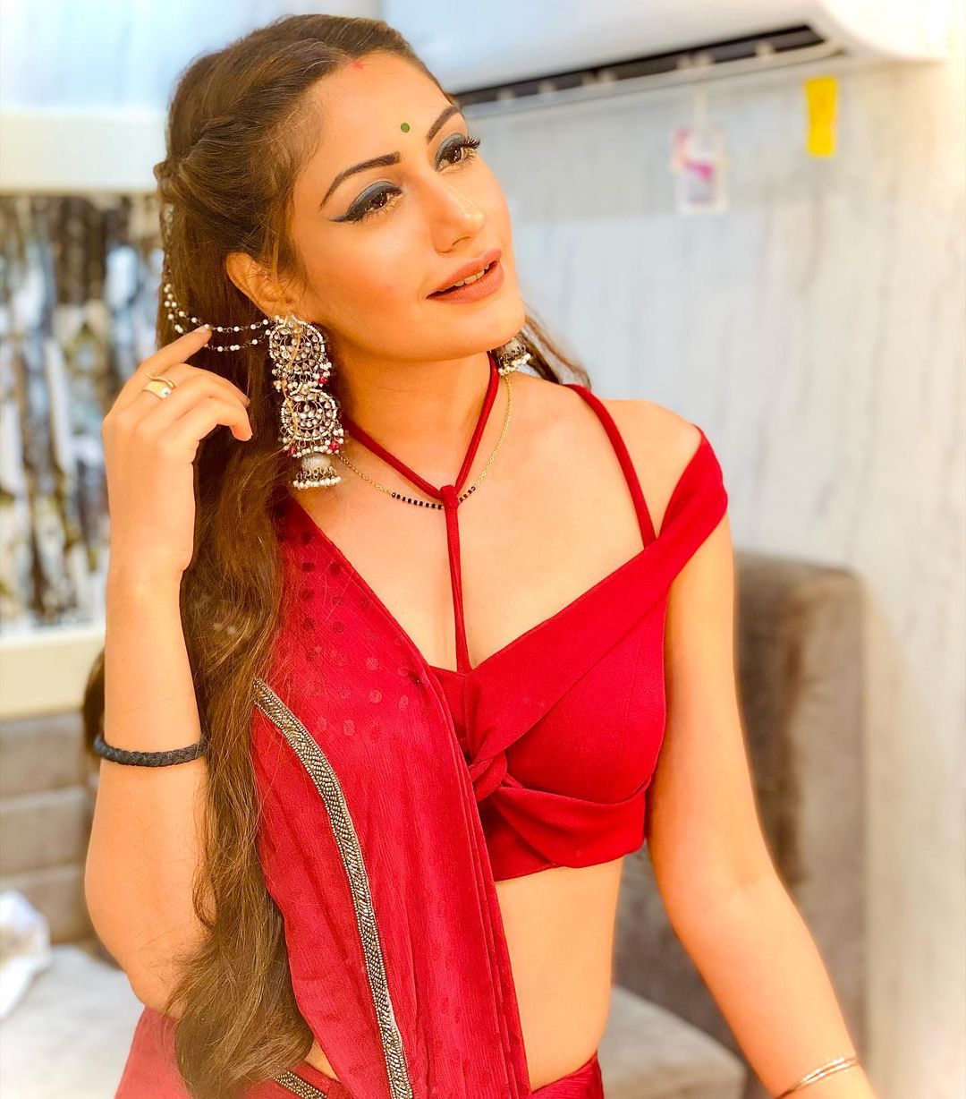 Surbhi Chandna flaunting her off-shoulder strap blouse with sexy saree