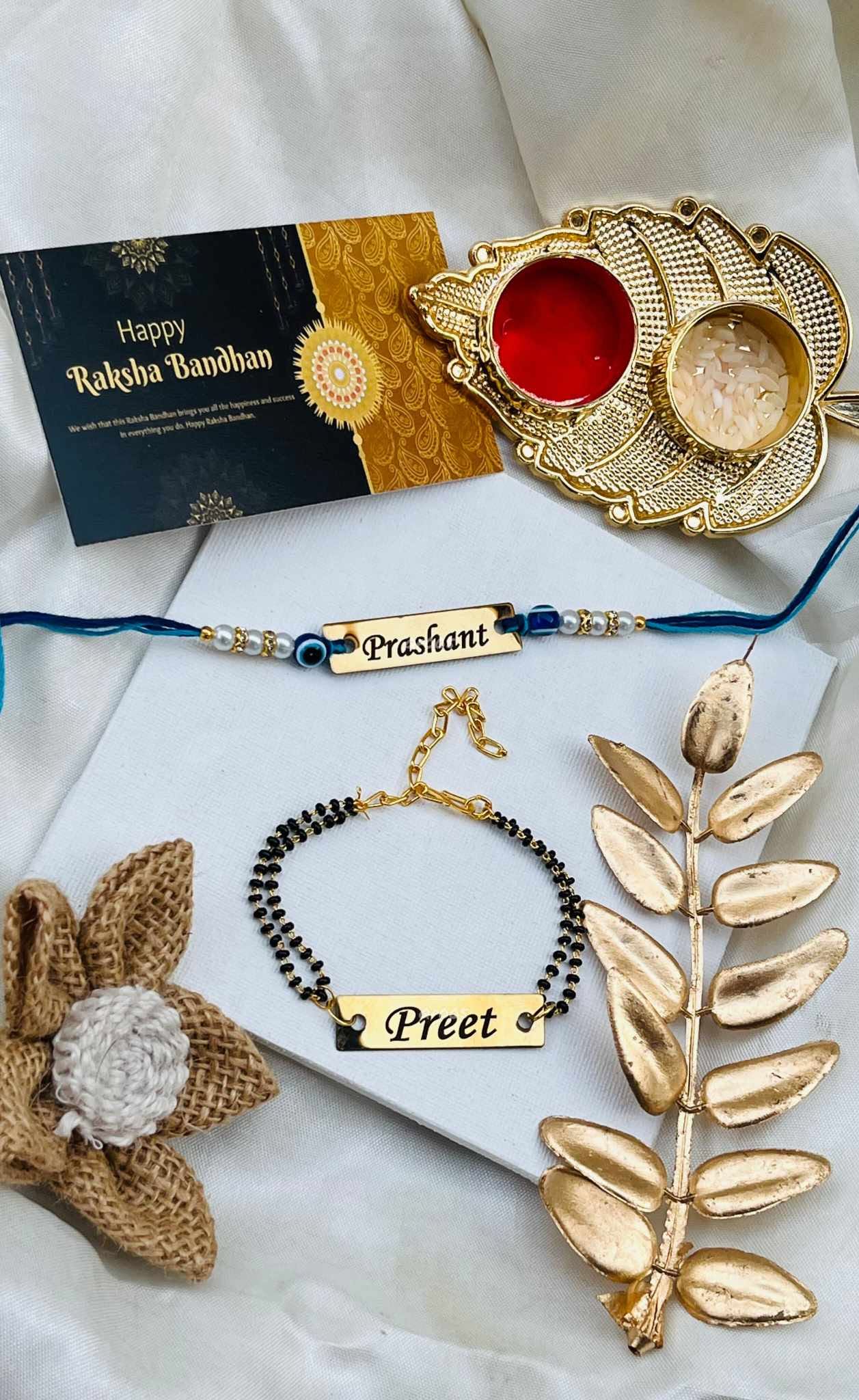 Personalized Rakhi & Name Bracelet Combo for Brother and Sister | Custom Name Rakhi with Evil Eye | Personalized Name Bracelet Gift Set | Raksha Bandhan Gift Hamper Image