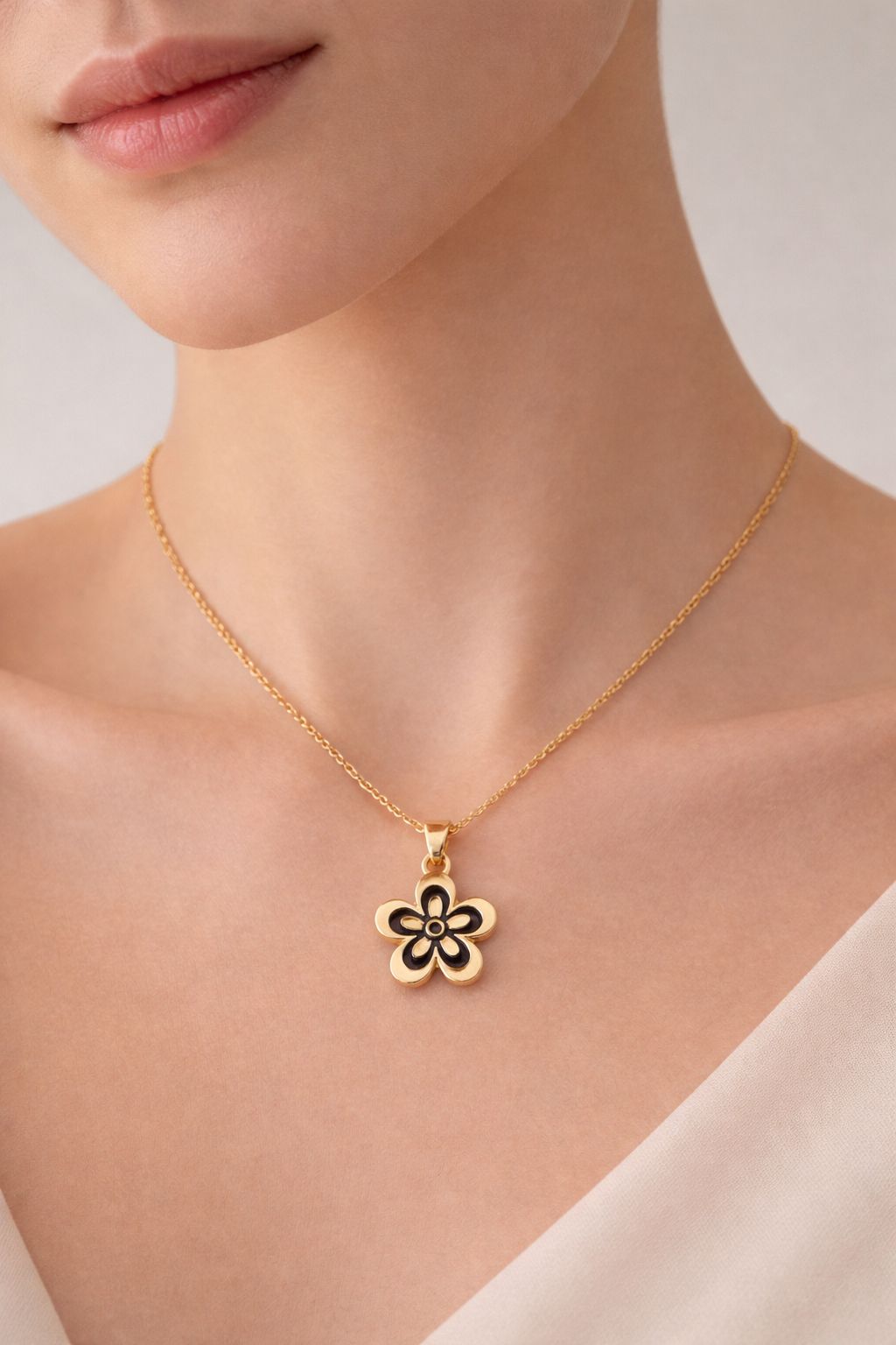 Elegant Black Flower Gold-Tone Chain Necklace Image
