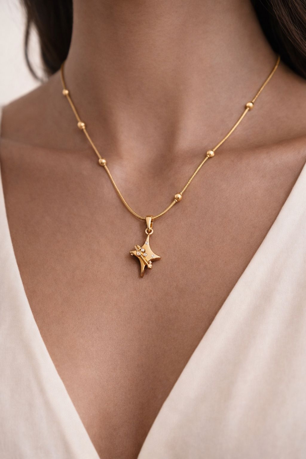 Gold-Tone Star Pendant Necklace with Beaded Chain Image 