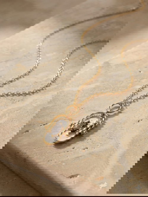 Elegant Gold-Tone Pendant Necklace with Stone and Pearl Accents