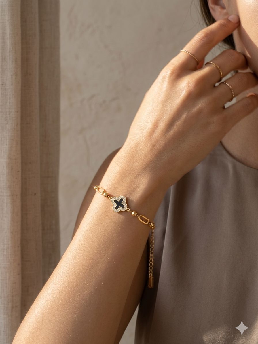 Four-Leaf Clover Bracelet with Black Enamel and Gold Chain Image 