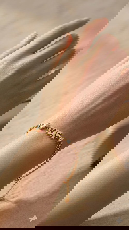 Gold-Toned 'LOVE' Charm Bracelet with Heart & Crystal Details Image