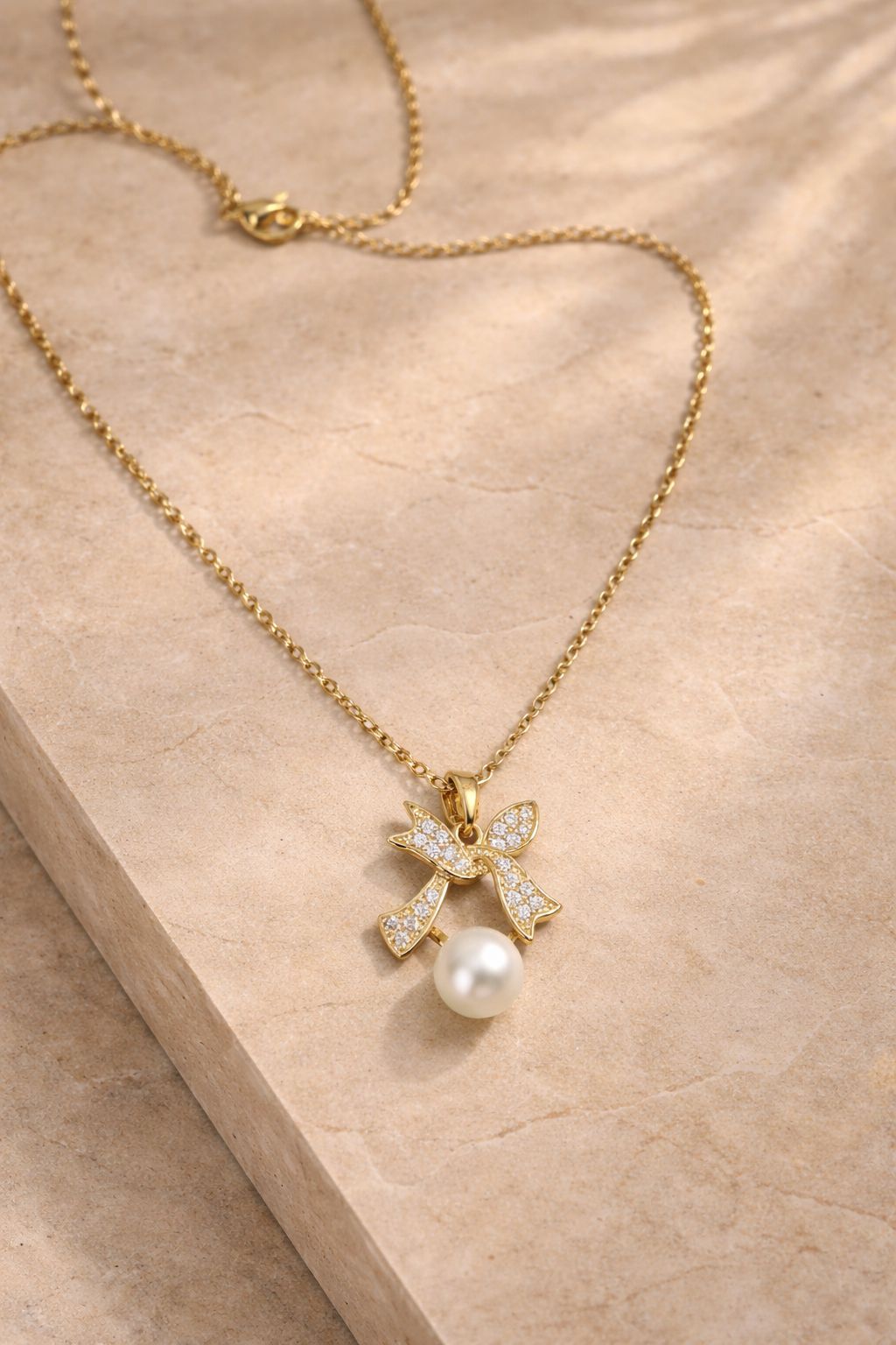 Gold-Plated Bow Pearl Pendant Necklace Image 