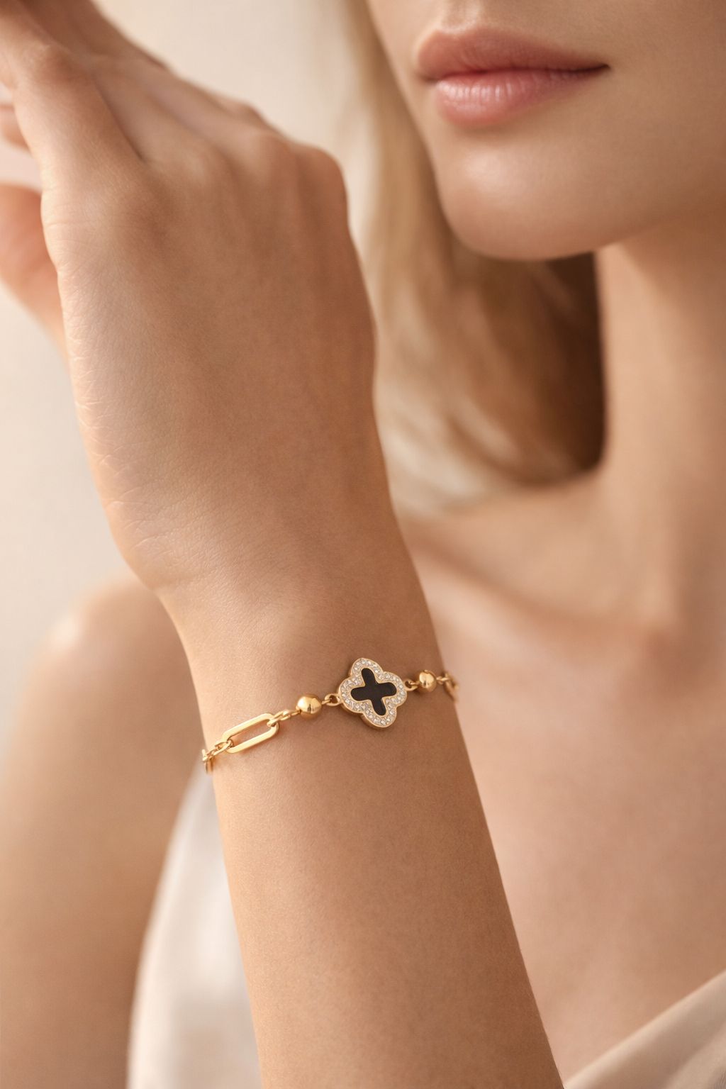 Four-Leaf Clover Bracelet with Black Enamel and Gold Chain Image 