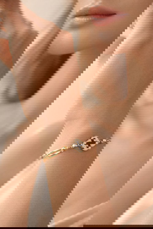 Four-Leaf Clover Bracelet with Black Enamel and Gold Chain