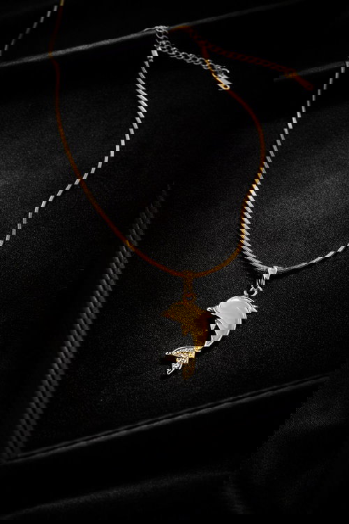 Gold-Toned Dolphin Pendant Necklace with Crystal Accents