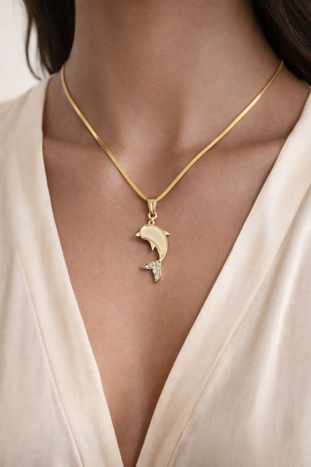 Gold-Toned Dolphin Pendant Necklace with Crystal Accents Image 