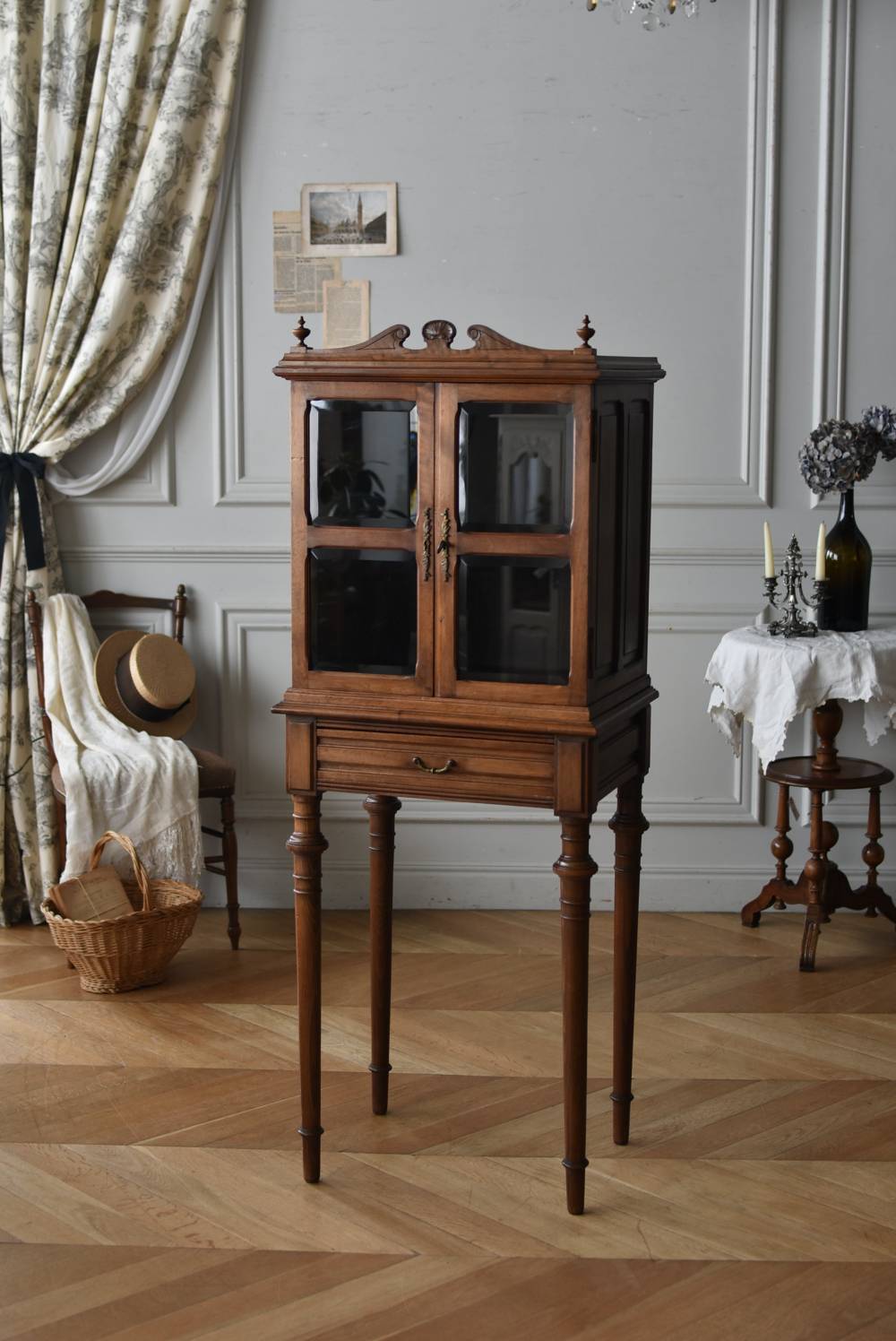Antique glass cabinet. Image