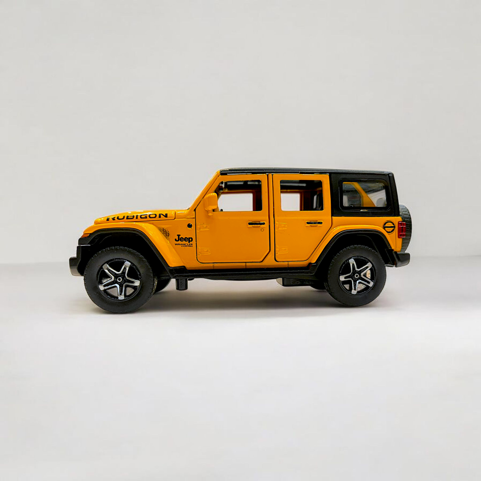 Jeep Wrangler Rubicon Diecast Model 1:32 – Pull Back, Lights, Sound & Open Doors Image