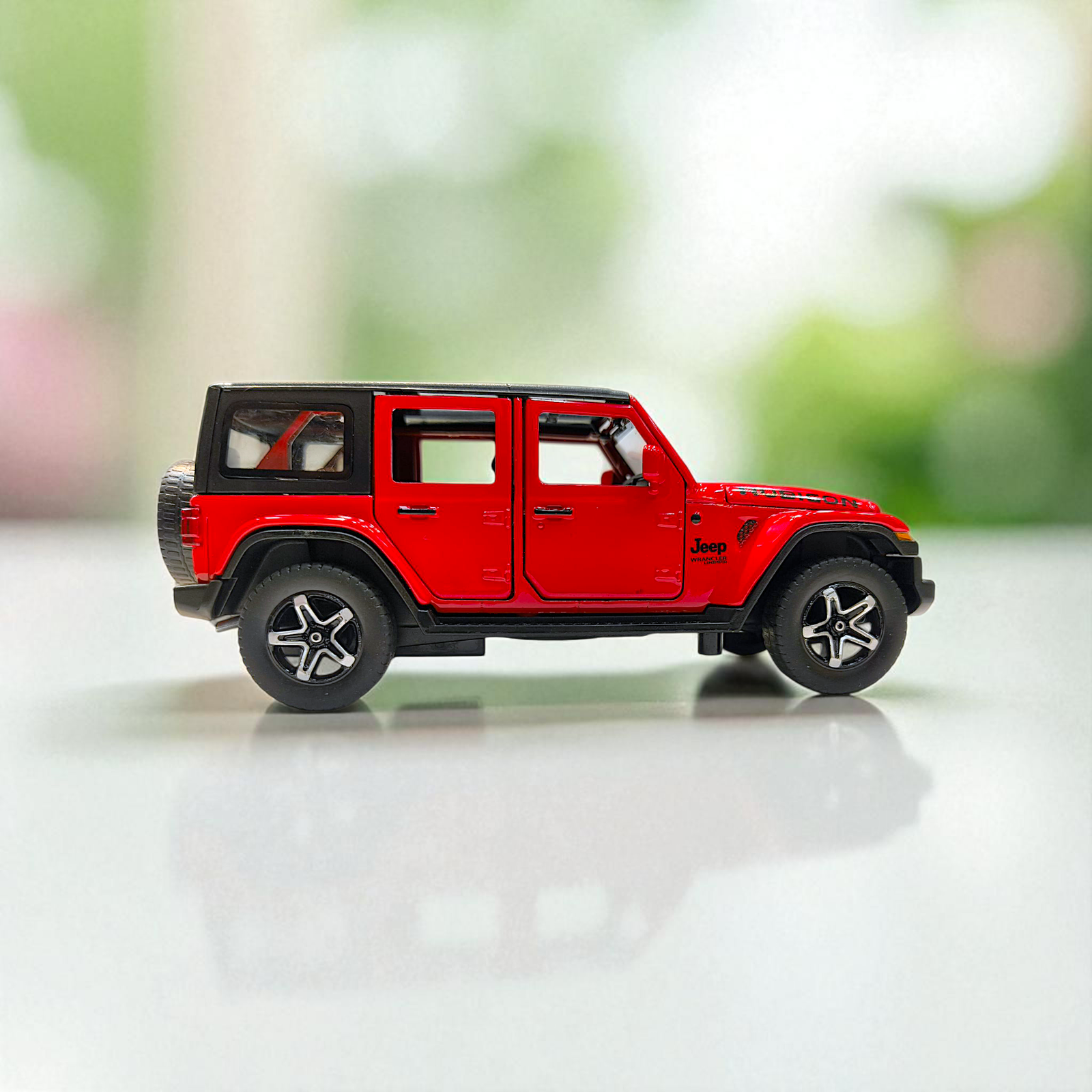 Jeep Wrangler Rubicon Diecast Model 1:32 – Pull Back, Lights, Sound & Open Doors Image