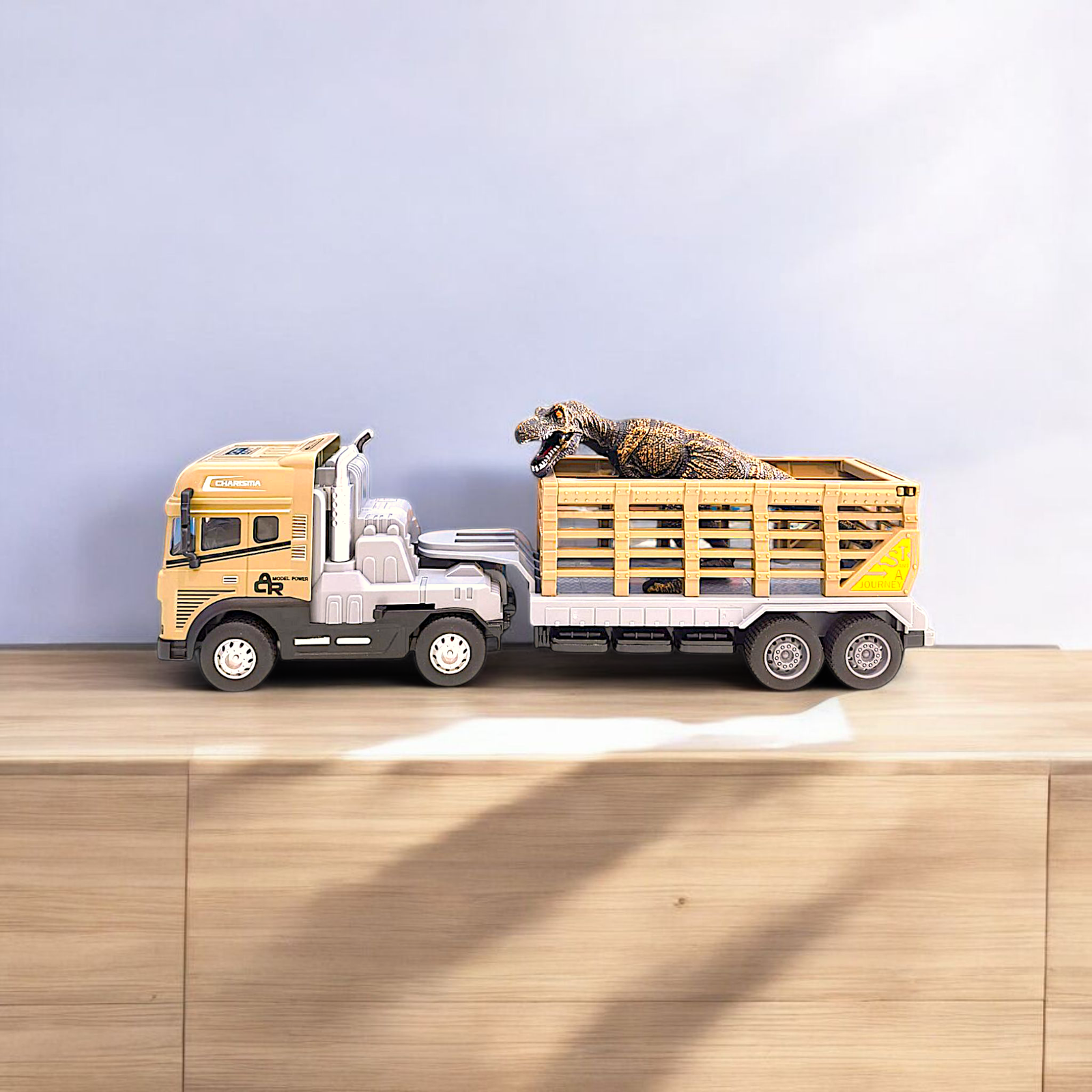 Dino Hauler: Die-Cast Pullback Truck with Light, Sound & Rubber Dinosaur Image