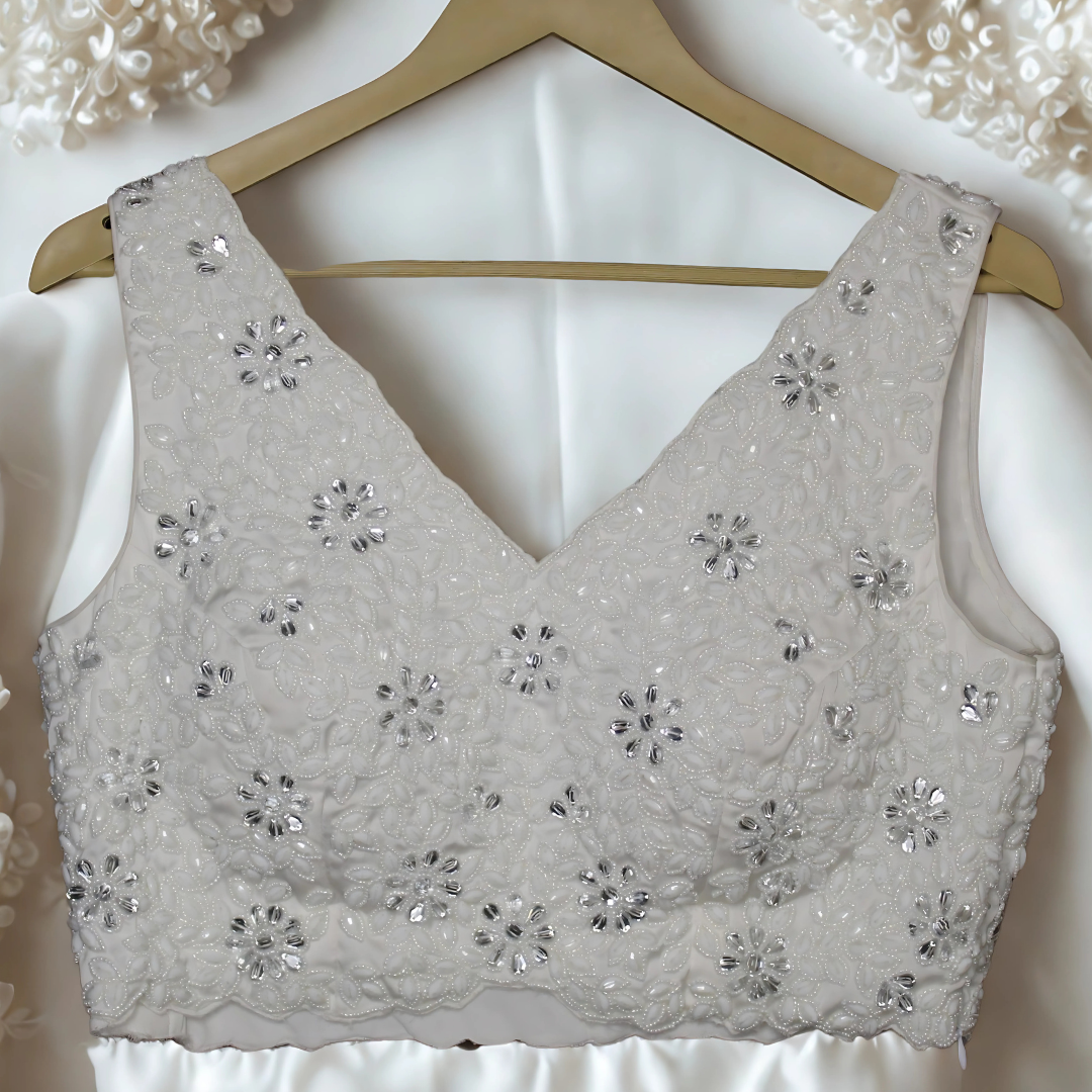 Ivory Bloom: White Designer Blouse with Pearl & Cut Dana Floral Charm Image