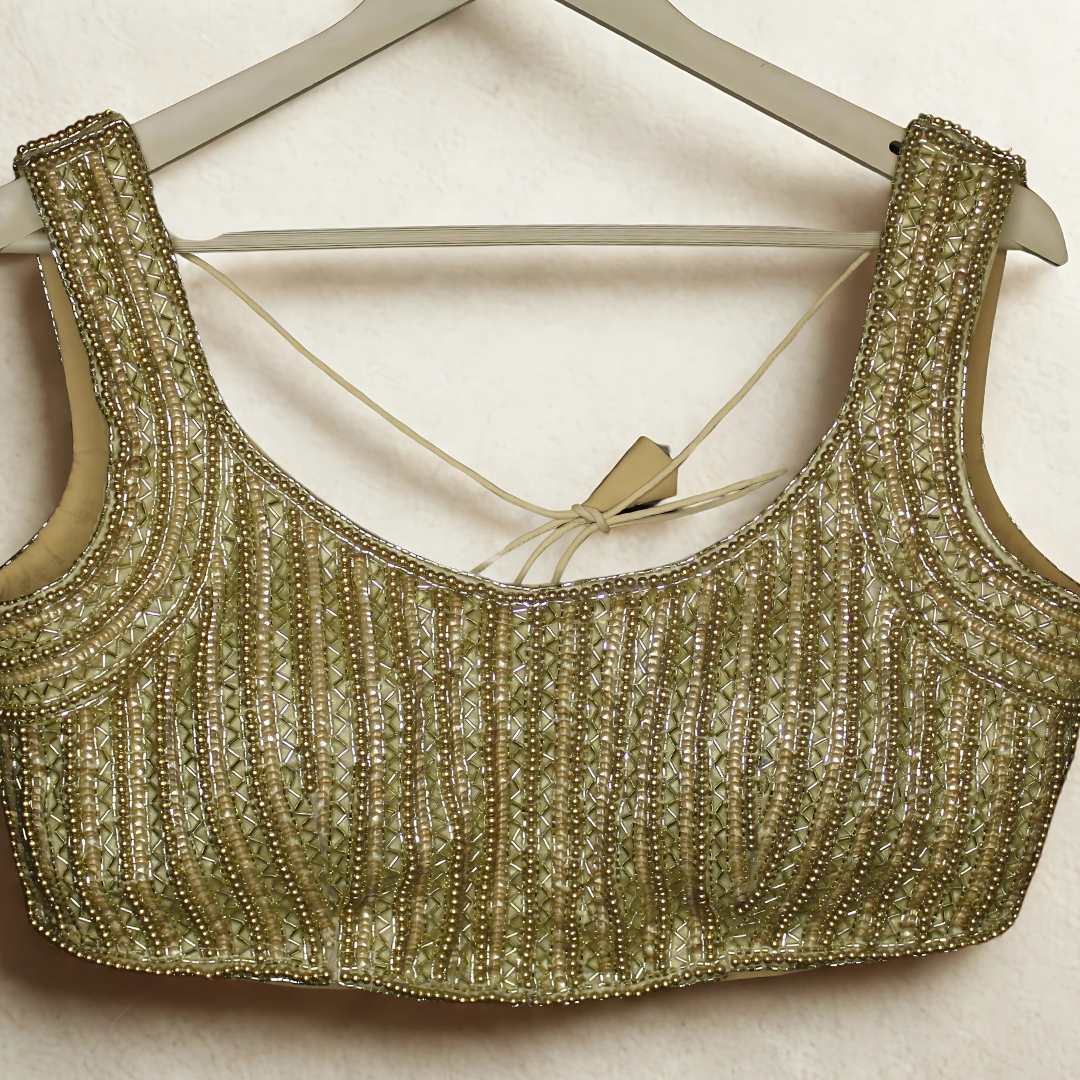 Radiate Royalty: Golden Designer Blouse with Luxe Handcrafted Embellishments Image