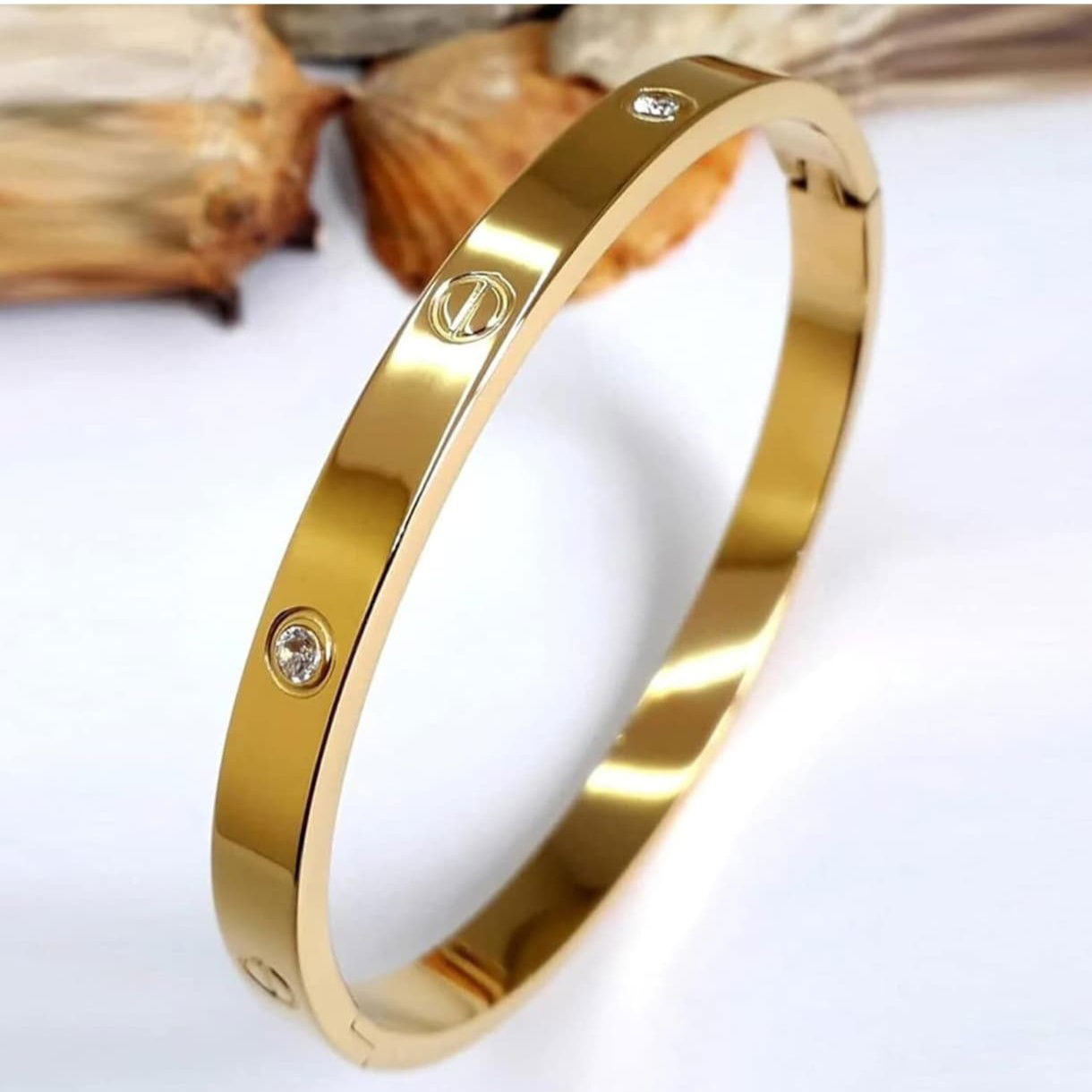Luxury Gold-Plated Screw Motif Bangle with Cubic Zirconia Accents Image