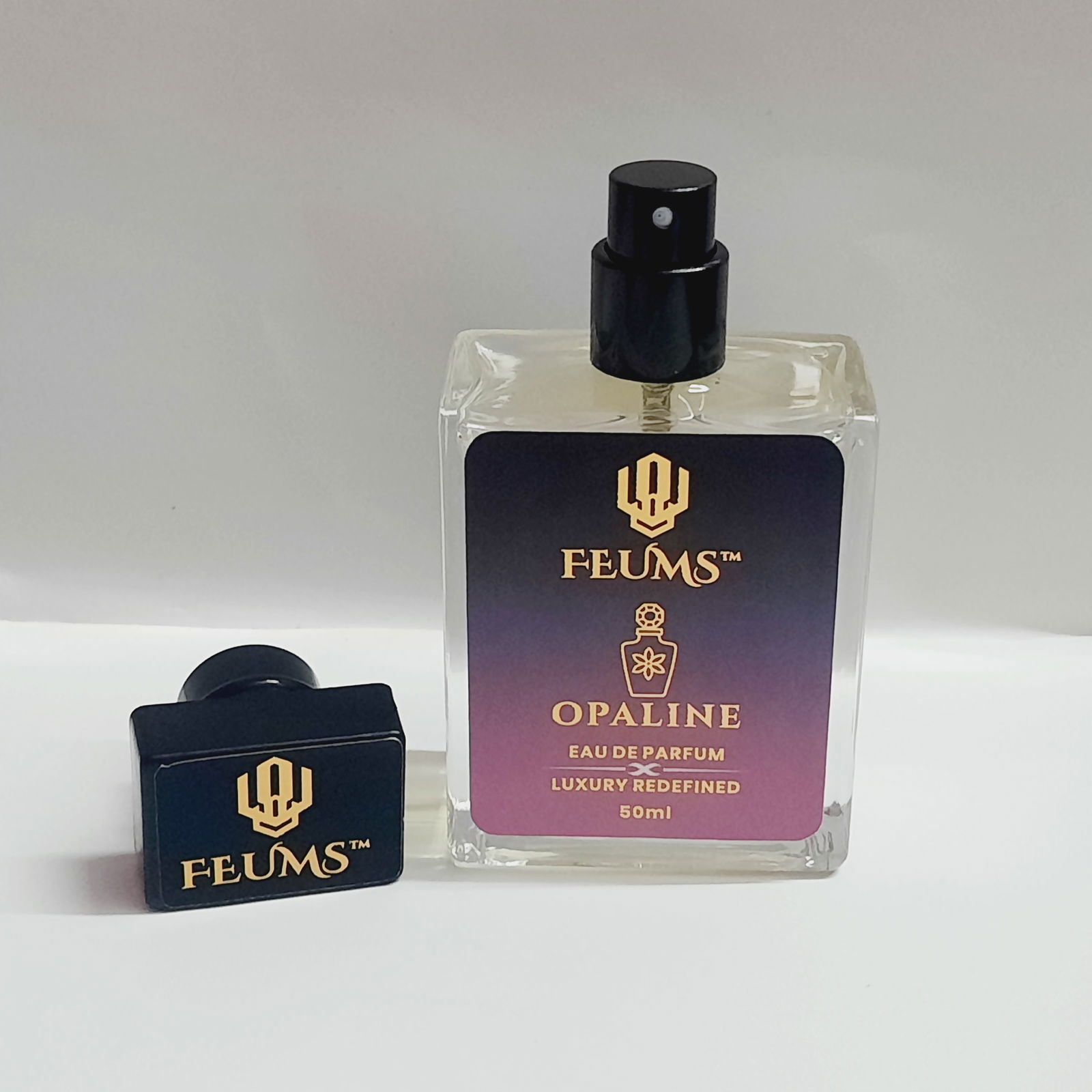 Feums Opaline – Dark, Addictive Energy With The Aura Flask Bottle. Image