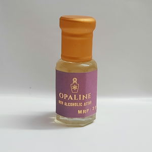 Feums Opaline Attar – Dark, Addictive Energy With The Rih Flask Bottle.  Image